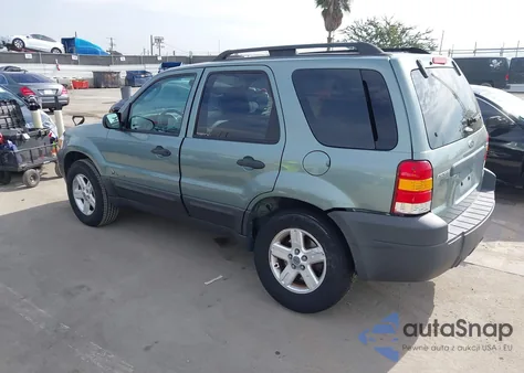 2007 Ford Escape Hybrid from USA, damaged, VIN 1FMCU49H27KA67453